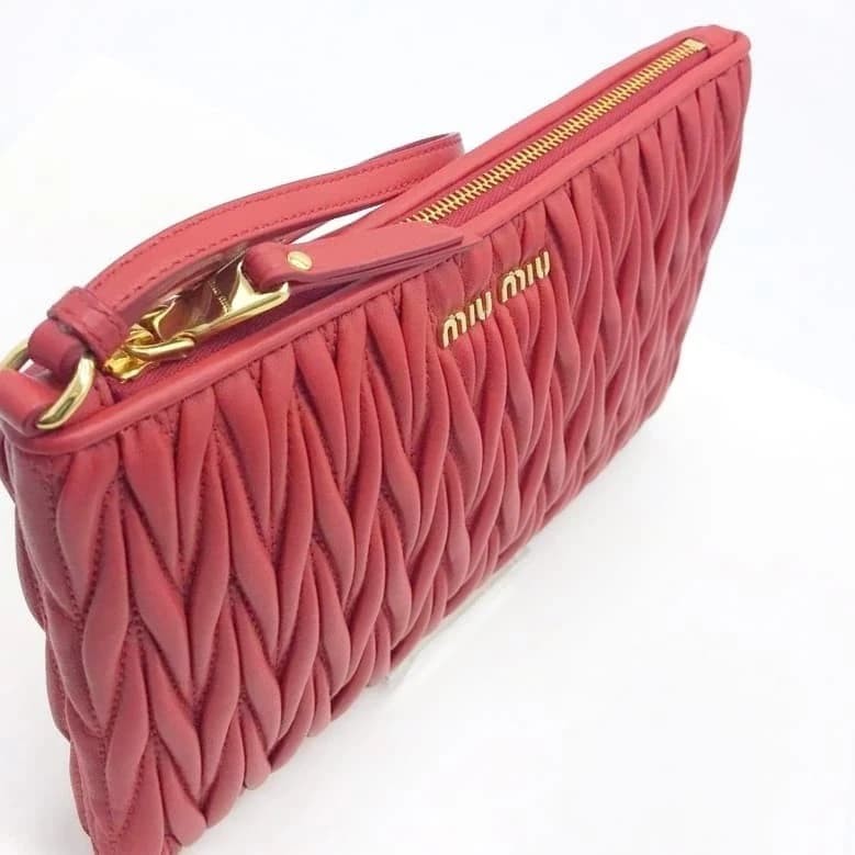 Miu Miu Matelasse Wristlet Clutch - CHIC Kuwait Luxury Outlet