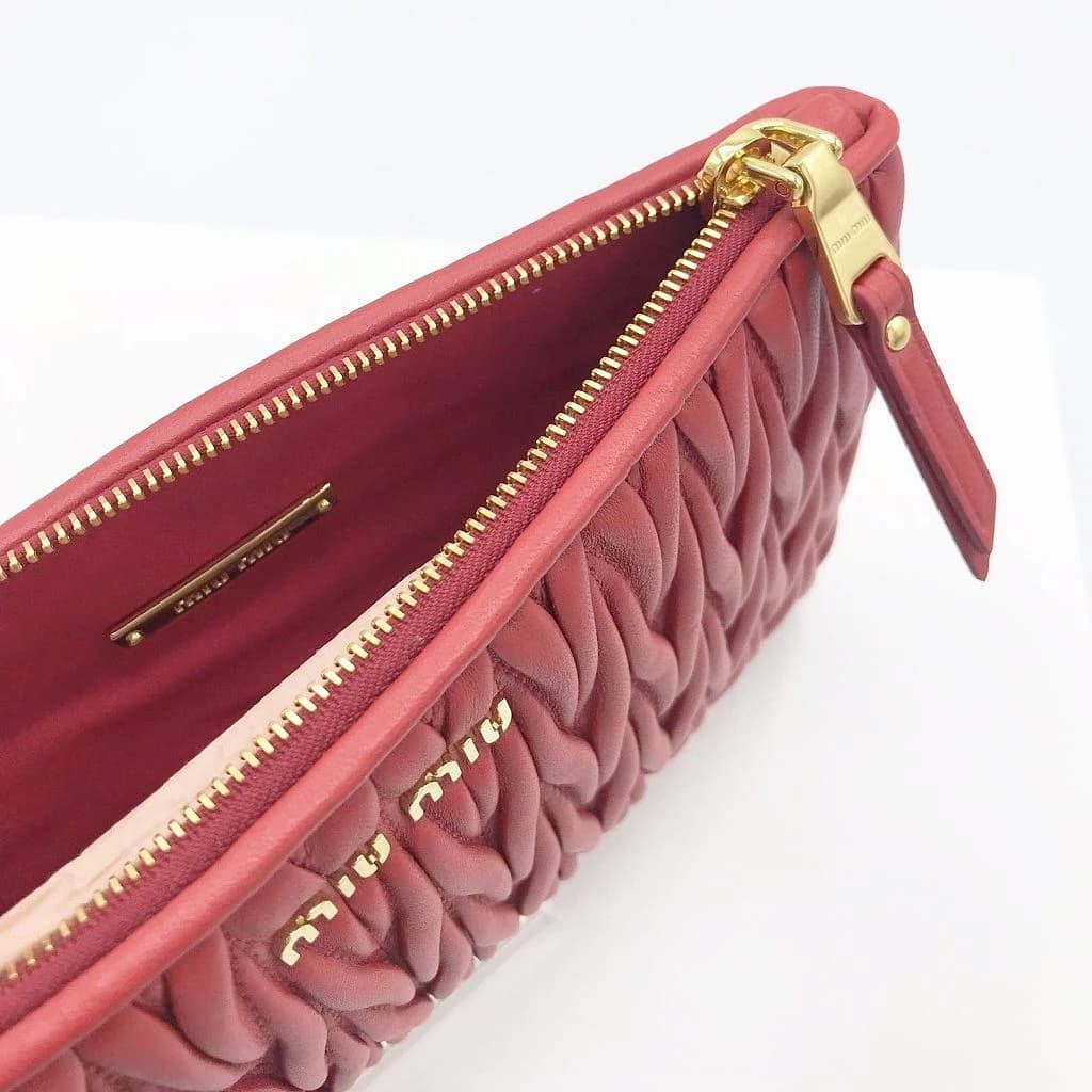 Miu Miu Matelasse Wristlet Clutch - CHIC Kuwait Luxury Outlet