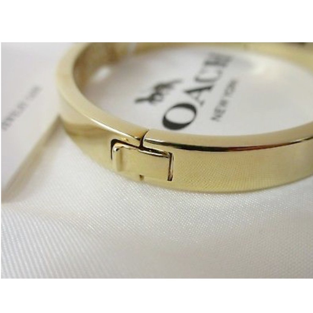 Coach Gold Bangle Hanging Logo - CHIC Kuwait Luxury Outlet