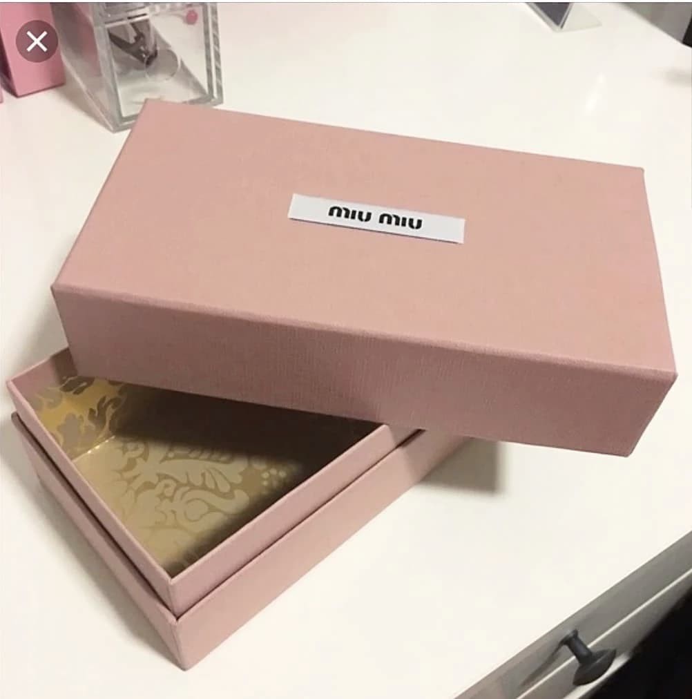 Miu Miu Matelasse Bow Zip Around Wallet - CHIC Kuwait Luxury Outlet