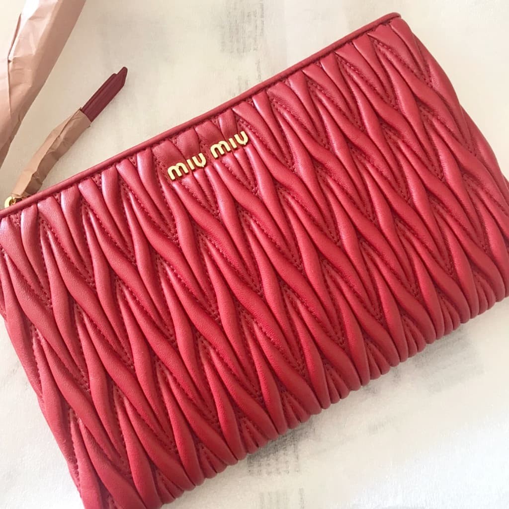 Miu Miu Matelasse Wristlet Clutch - CHIC Kuwait Luxury Outlet