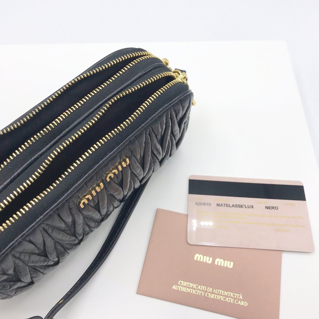 Miu miu matelasse online camera bag